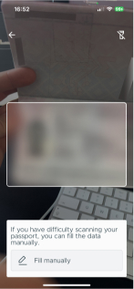 Mobile app | Scanning the details on a passport document with device's camera (note: document details redacted)